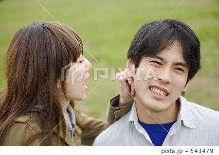 人物 女性 耳 引っ張るの写真素材