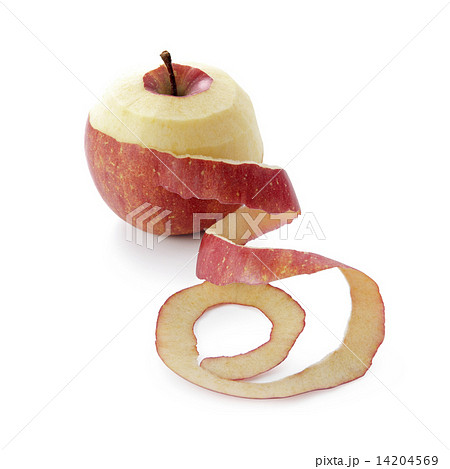 リンゴ 林檎 皮むき フルーツ ピーリングの写真素材