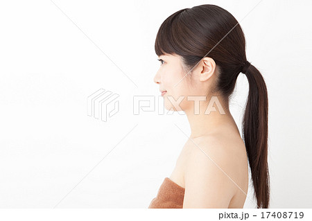 ポニーテール 女性 横顔 つやの写真素材
