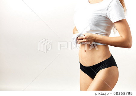 pretty girl demonstrating her underwear - Stock Photo [68368765