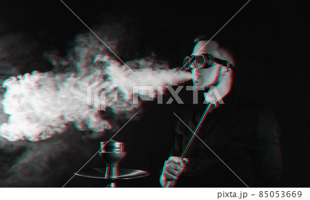 煙を吐くの写真素材