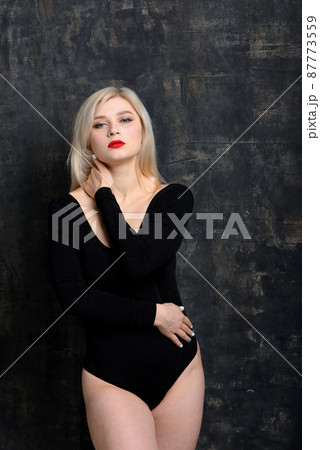 Vertical photo of plus size young woman in sexy black lingerie